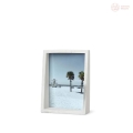 Ramka na zdjęcie Umbra Edge 13 cm, biały marmur
